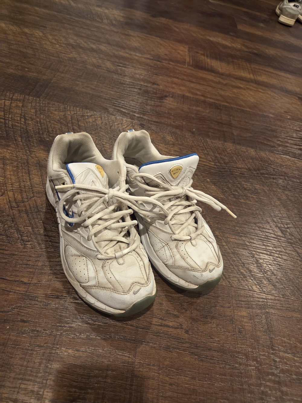 Nike Women's White Sneakers with Blue and Yellow Accents